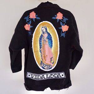 VIDA LOCA distressed denim jacket.